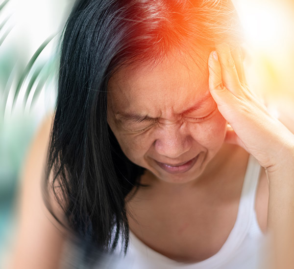 Woman showing headache